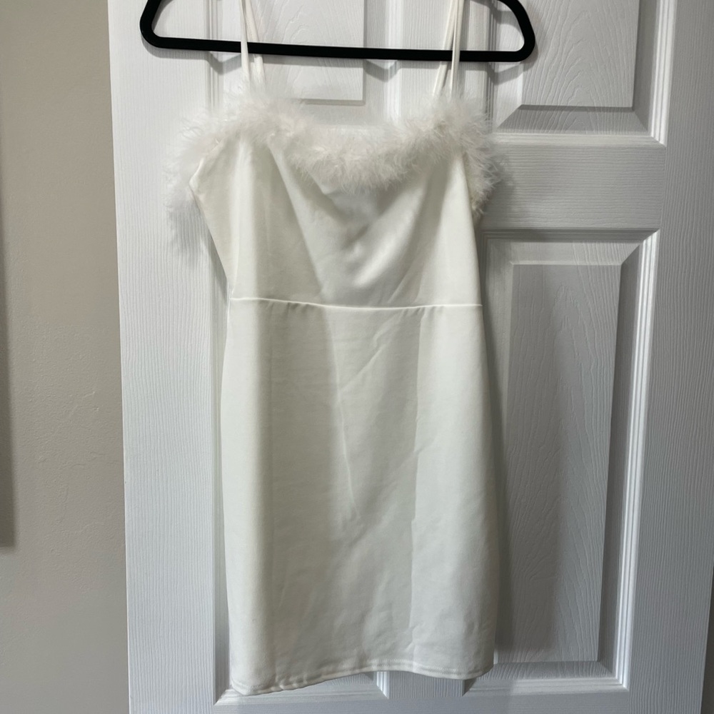 Nastygal white mini dress with feather lining, size 10